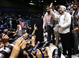 Saeed Jalili waving his hands to the crowd of his supporters during his first election campaign in Tehran on May 24,2013. (Photo Credit: Nasim)