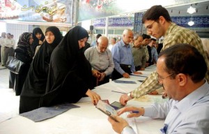 File photo shows people casting their votes in Iran’s 10th presidential election, June 2009.