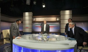 Iran's President Mahmoud Ahmadinejad(left), talks with Mir Hossein Mousavi ( right), before their TV debate on June 3, 2009. (Photo Credit: IRIB)