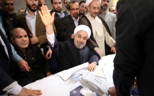 Hassan Rohani, one of leading reformists candidates waving hands to journalists.