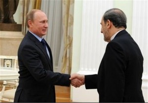 ran's Ali Akbar Velayati (R) shakes hands with Russian President Vladimir Putin before a meeting in Moscow on January 28, 2015. (Photo Credit: TasnimNews.)